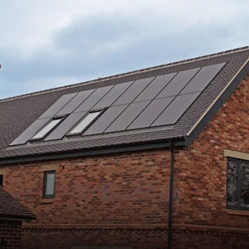 A house with solar panels on the roof.