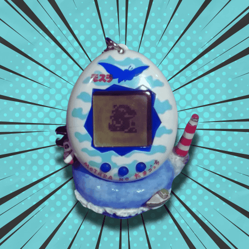 FINALLY! I got the special character, Godzilla, in my Tamagotchi Mothra!