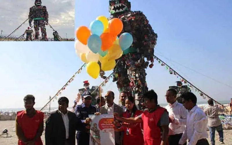 monster made of discarded plastic on coxs bazar beach