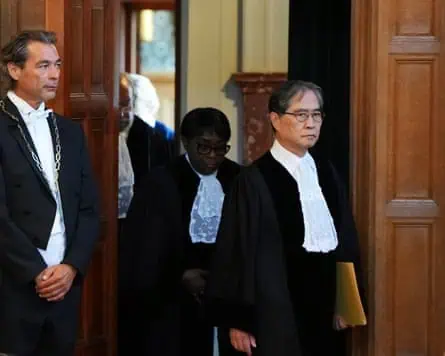 ICJ President Yuji Iwasawa (right) says climate change has 'serious and far-reaching' consequences. Photo: Peter Dejong/AP