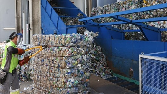 Certain plastics, like PET from beverage bottles, are easier to recycle, yet many don't reach recycling facilities. Photo: K. K. Cheng/Newscom/Picture Alliance.