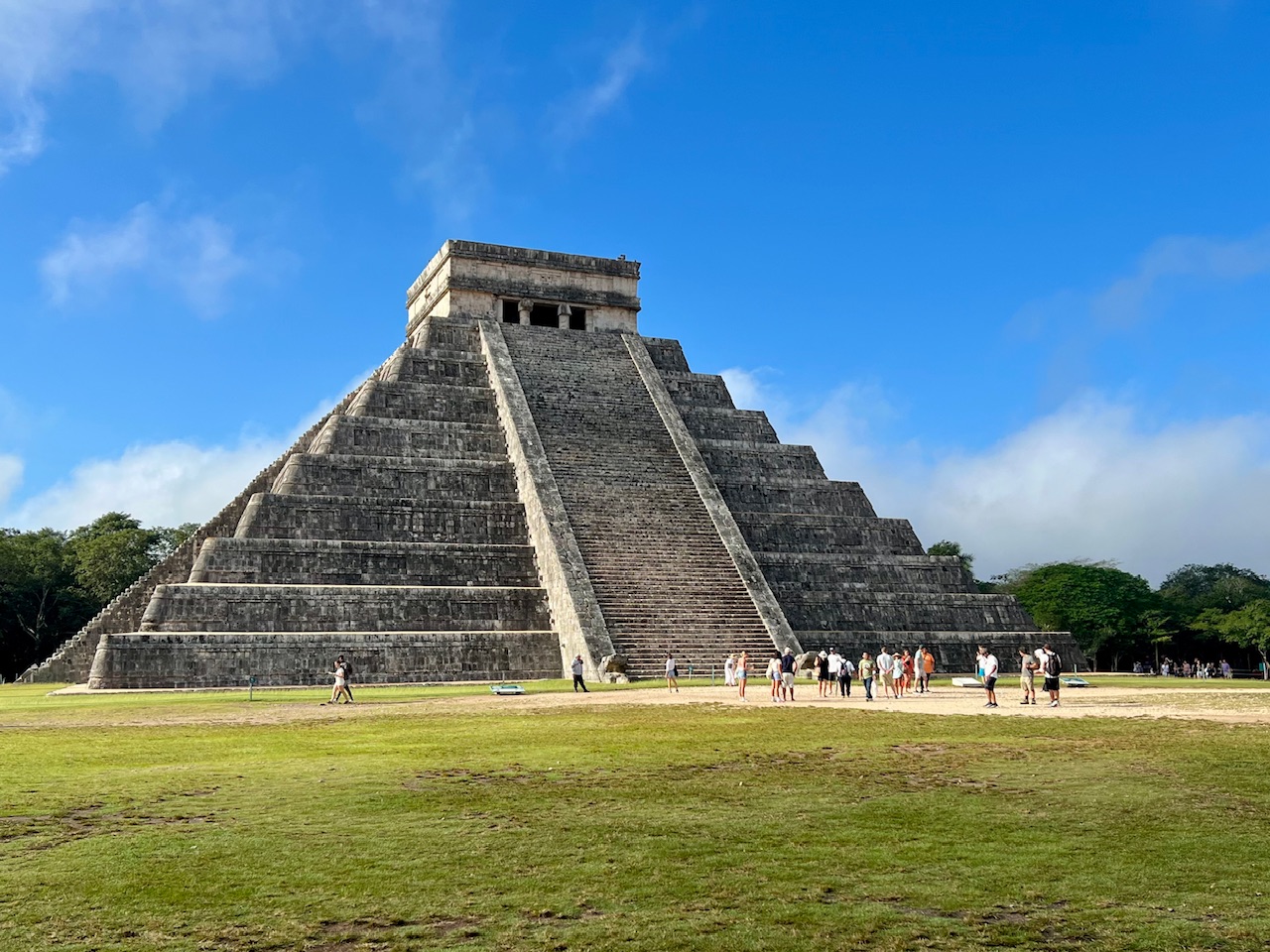 Temple of Kukulcán at Chichen Itza with a blue sky
