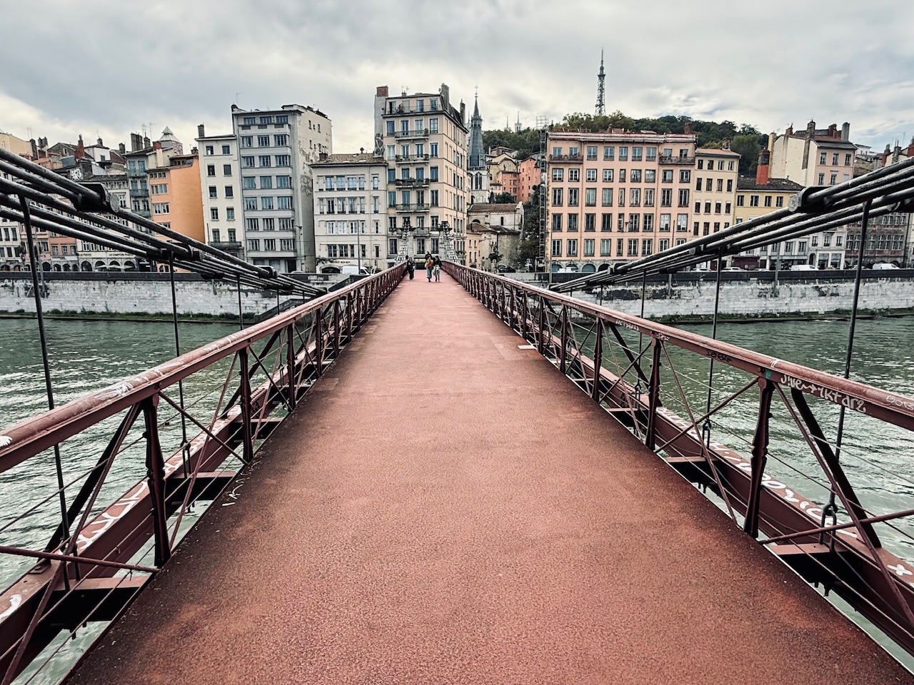 Looking across a bridge to Vieux Lyon as it crosses the Saône River in Lyon France