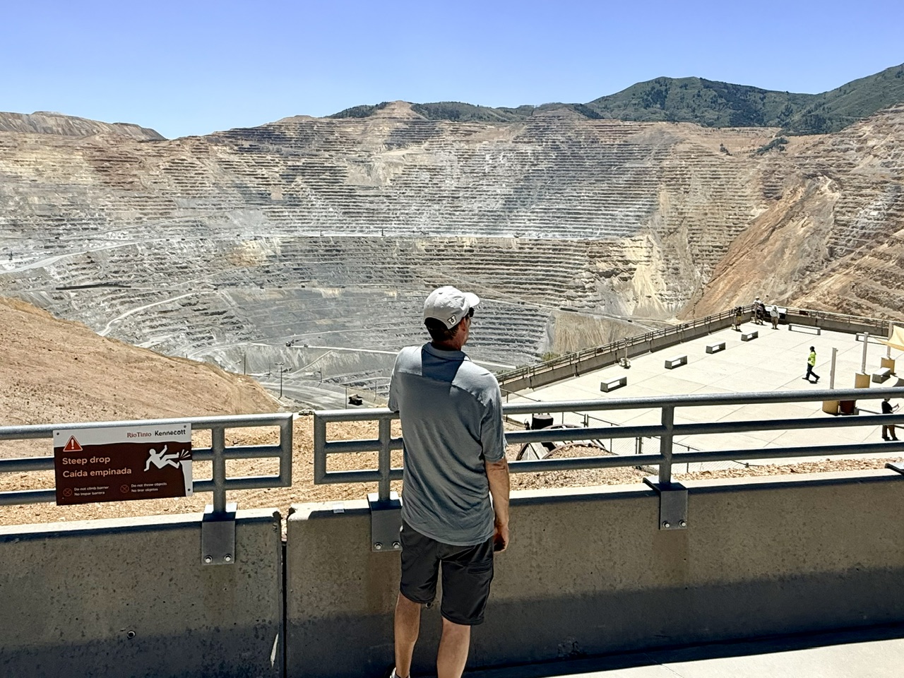 A visitor looks out across the Bingham Canyon Mine while on the Kennecott Copper Mine Tour