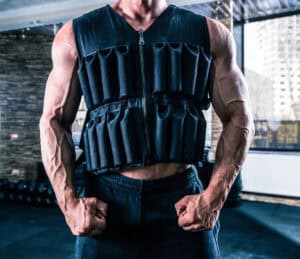 Bodybuilder wearing a Rogue weight vest