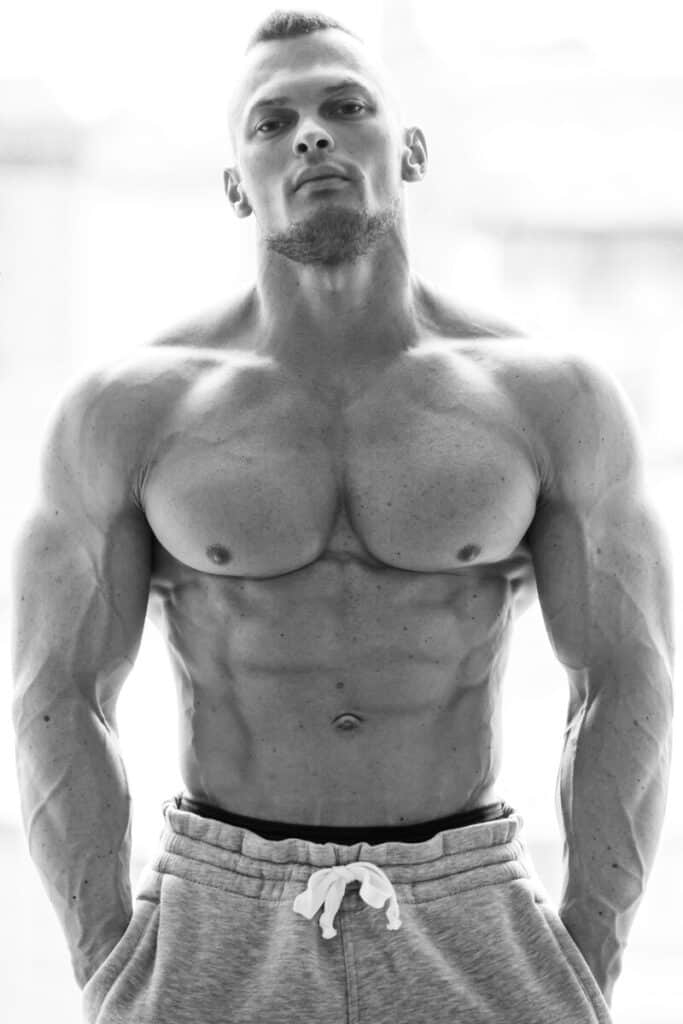 visible veins from bodybuilding on a young handsome man