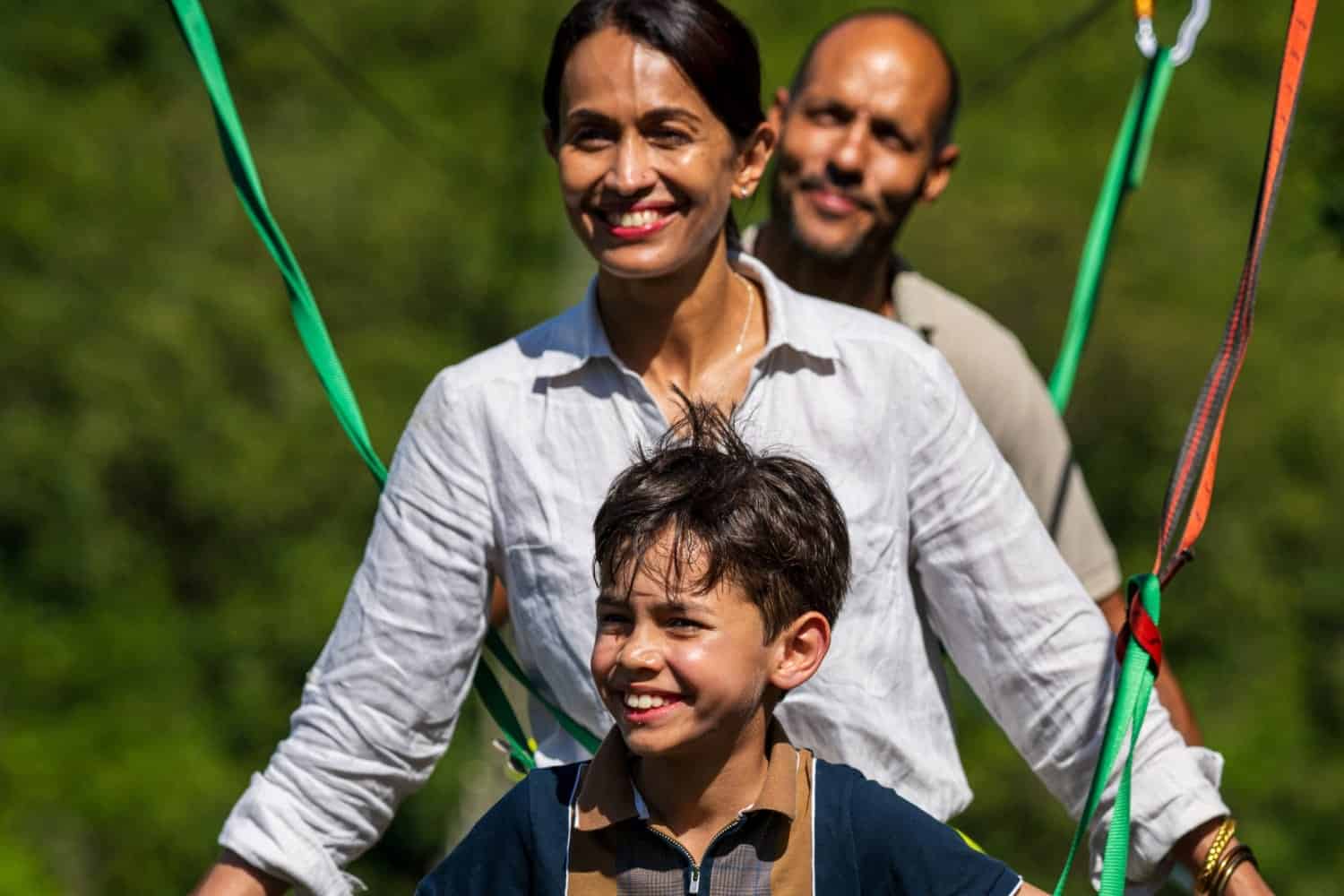 family all smiles in Mauritius trying nepales bridge