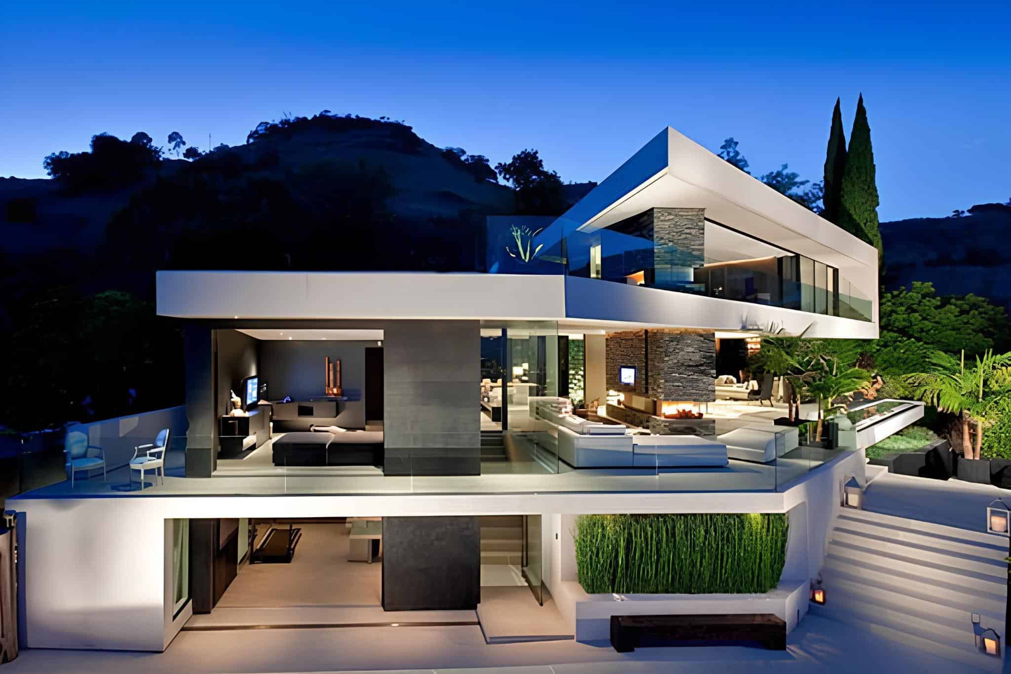 Modern luxury house with contemporary architecture, large glass windows, open outdoor living spaces, and stylish design, set against a scenic hillside background.
