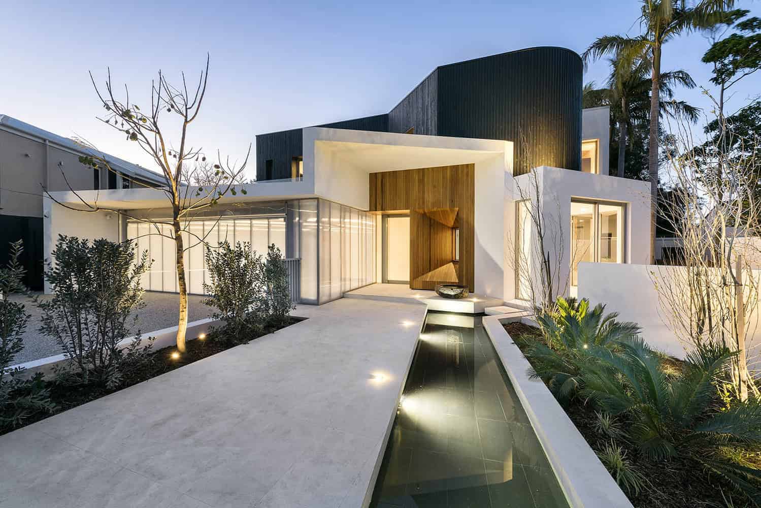 Modern contemporary house exterior with sleek design, minimalist landscaping, and clean lines, showcasing innovative architecture and stylish outdoor lighting.