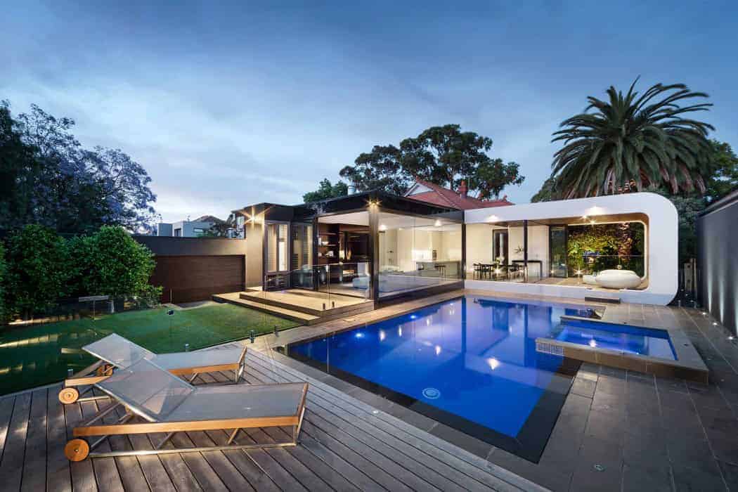 Modern luxury house with sleek architecture, outdoor pool, and contemporary design, perfect for stylish outdoor living and relaxing in a sophisticated modern home.