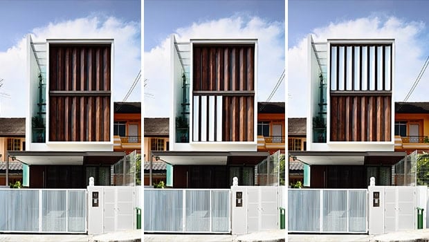 Modern minimalist residential facade with wooden and white structural elements, emphasizing contemporary architecture and design.