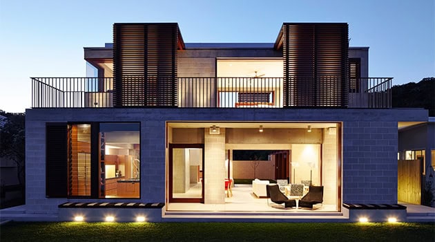 Contemporary modern house with sleek architecture, large glass windows, and stylish outdoor spaces showcasing luxury residential design.