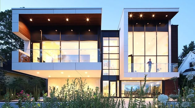 Modern luxury house with extensive glass windows and contemporary architecture, showcasing sleek design, open living spaces, and stylish exterior for upscale residential architecture and design.