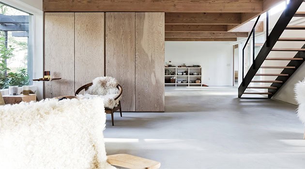 Bright modern interior with natural wood accents, open floor plan, and contemporary design elements, perfect for stylish minimalist homes and modern architecture enthusiasts.