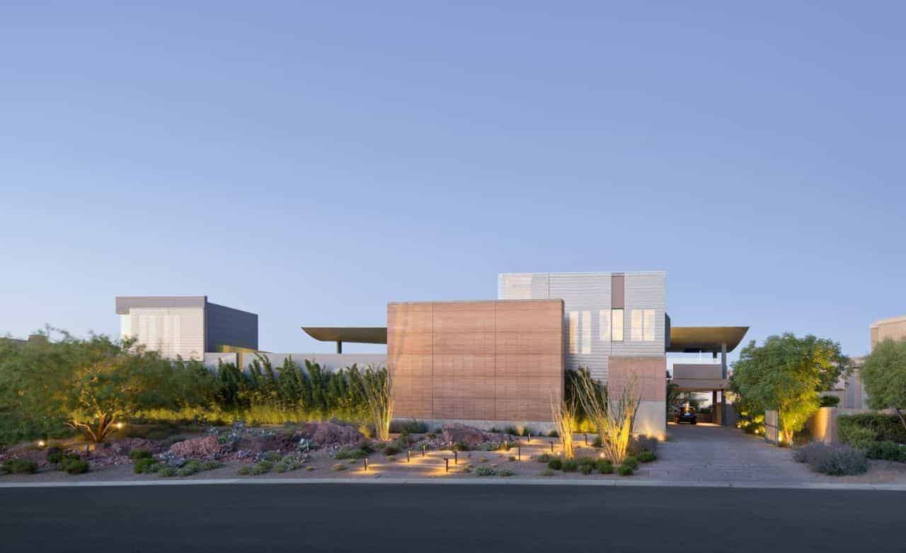 Modern luxury house with minimalist architecture featuring clean lines, contemporary design, and landscaped surroundings.