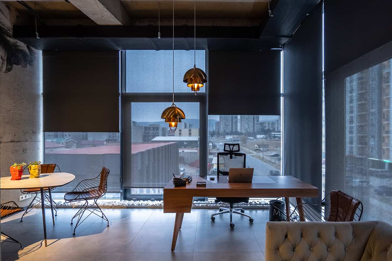 Modern office interior with large windows, contemporary furniture, and elegant lighting, showcasing stylish architecture and home decor ideas.