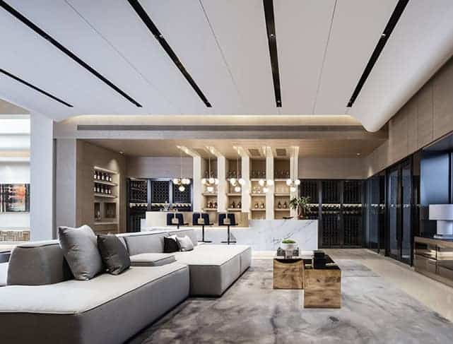 Luxurious modern living room with minimalist design, stylish furniture, and elegant lighting for contemporary architectural interior decor.