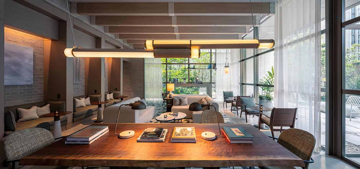 Modern interior design with open-concept living space, natural light, stylish furniture, and contemporary lighting fixtures showcasing innovative architecture and interior decor.