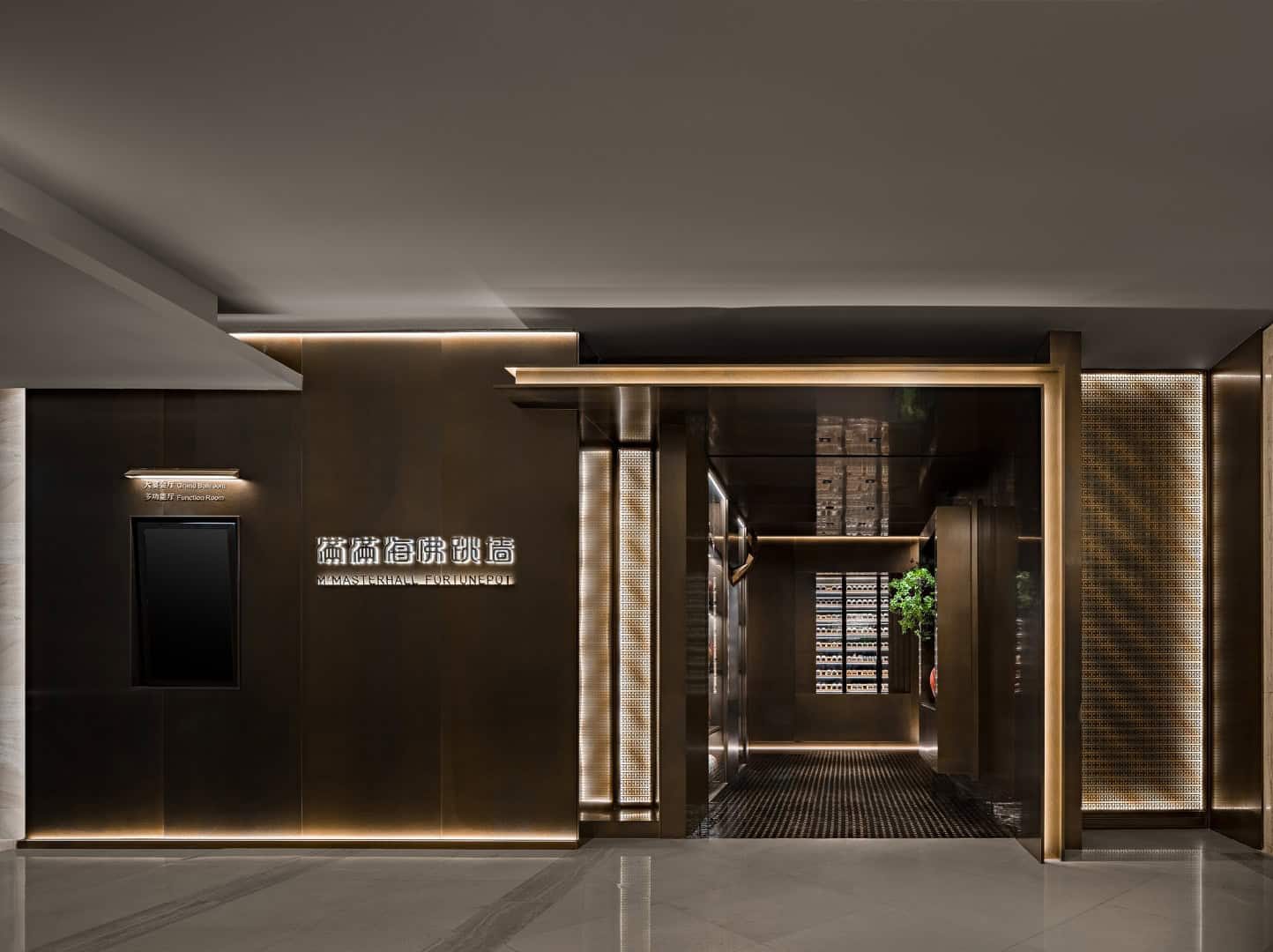Elegant modern building interior with sleek black and gold accents, ambient lighting, and sophisticated design, perfect for luxury architecture and interior design inspiration.
