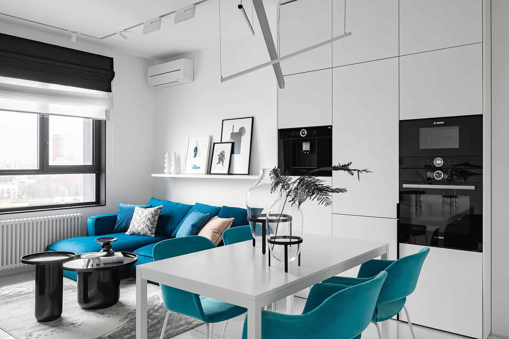 Modern minimalist white and blue living room interior with sleek cabinetry, stylish furniture, and contemporary decor showcasing interior design and architecture art.
