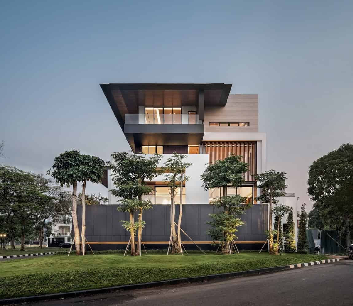 Modern contemporary house with sleek architectural design, large glass windows, and integrated natural elements, perfect for stylish urban living and innovative home architecture.