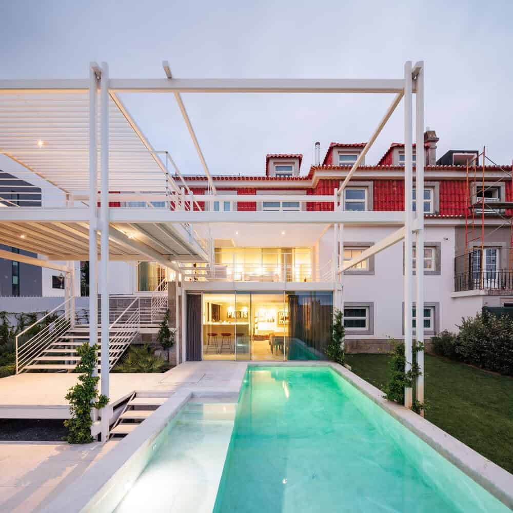 Contemporary modern residential house with a stylish outdoor pool, innovative architectural design, and urban aesthetic. Perfect for luxury living and modern architecture art.