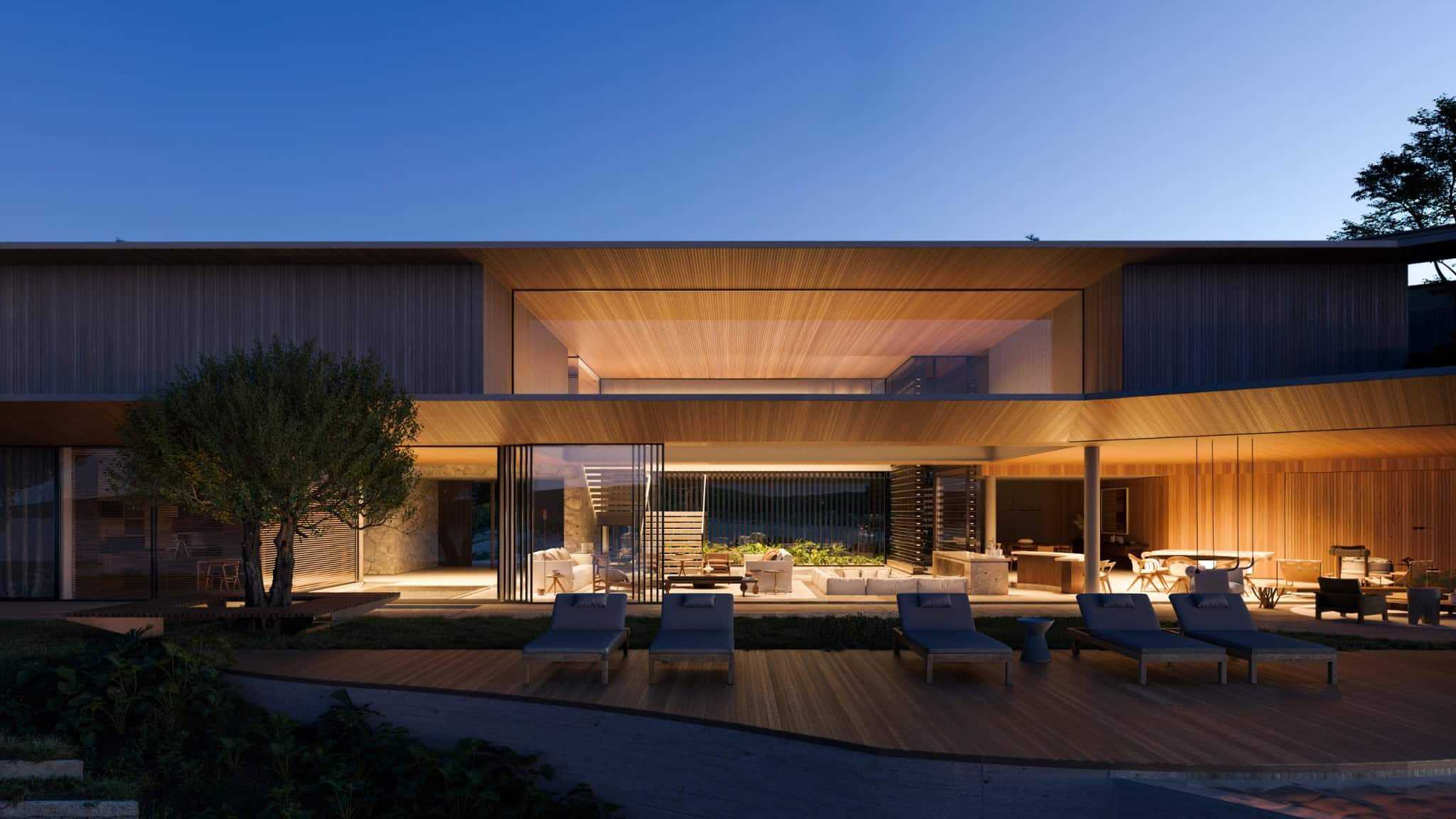 Sleek modern house with expansive glass walls, wooden accents, and outdoor lounging area highlighting contemporary architectural design and stylish outdoor spaces.