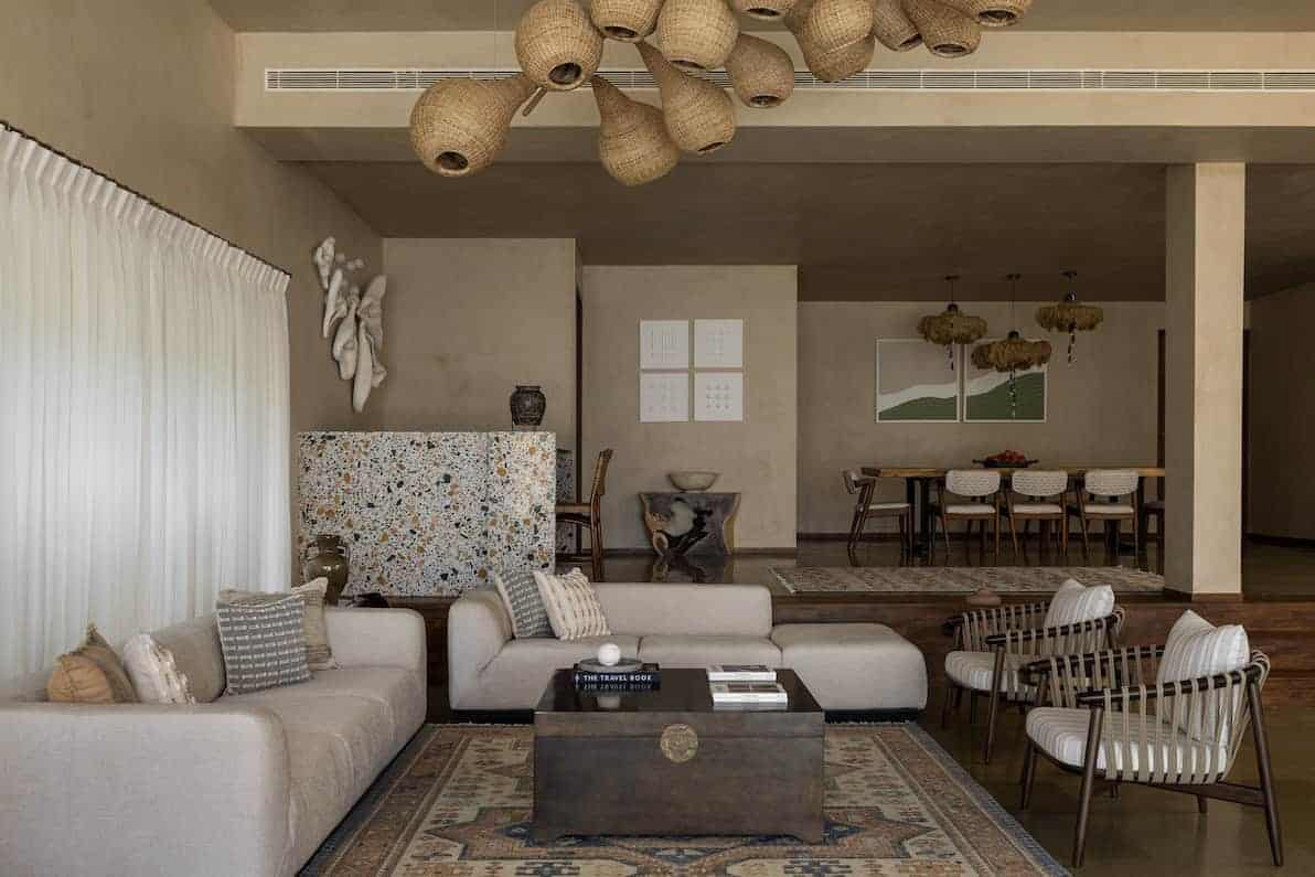 Elegant modern living room with neutral tones, contemporary furniture, and stylish decor, showcasing sophisticated architecture art design elements and cozy ambiance.