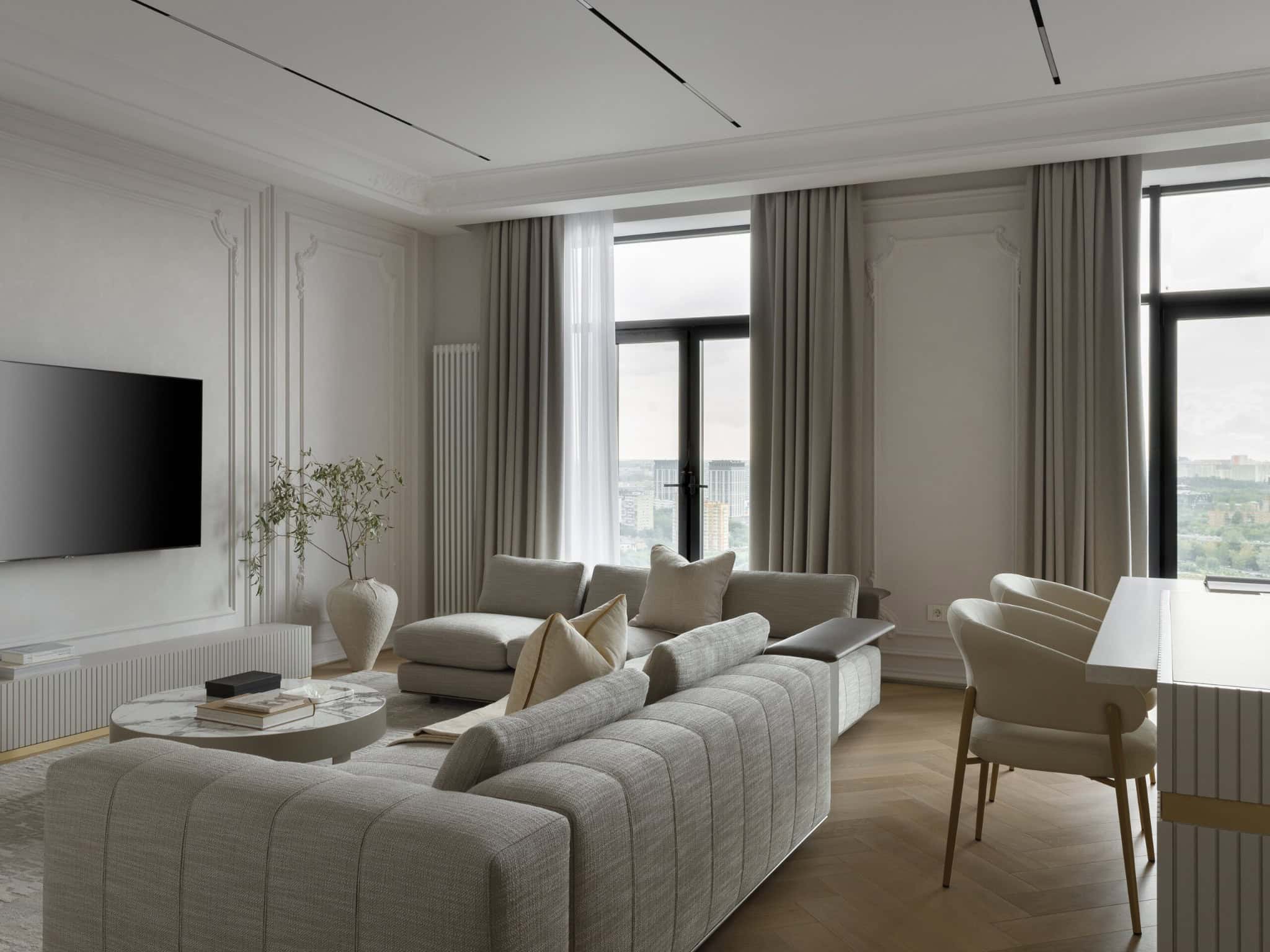 Luxurious modern living room with elegant white walls, large windows with drapes, stylish sofa, and contemporary decor, showcasing sophisticated interior design and architecture.