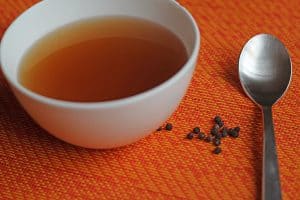 Peppercorn Chicken Broth - take simple everyday chicken broth and add extra flavor to keep you post-op weight loss surgery liquid diet more doable! Simple additions that don't change the texture but give the flavor new life will keep you happy during your healing diet! #wls #postop #wlsliquid #sleeve #bypass