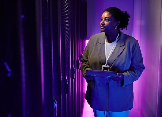 stock photo woman looking at servers