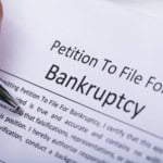 Petition to file for bankruptcy document with legal text and signature area.