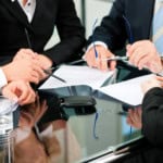 Attorneys and Client discussing Chapter 7 Bankruptcy qualifications