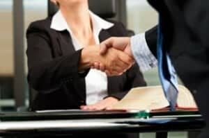 NC lawyer shaking hands with client