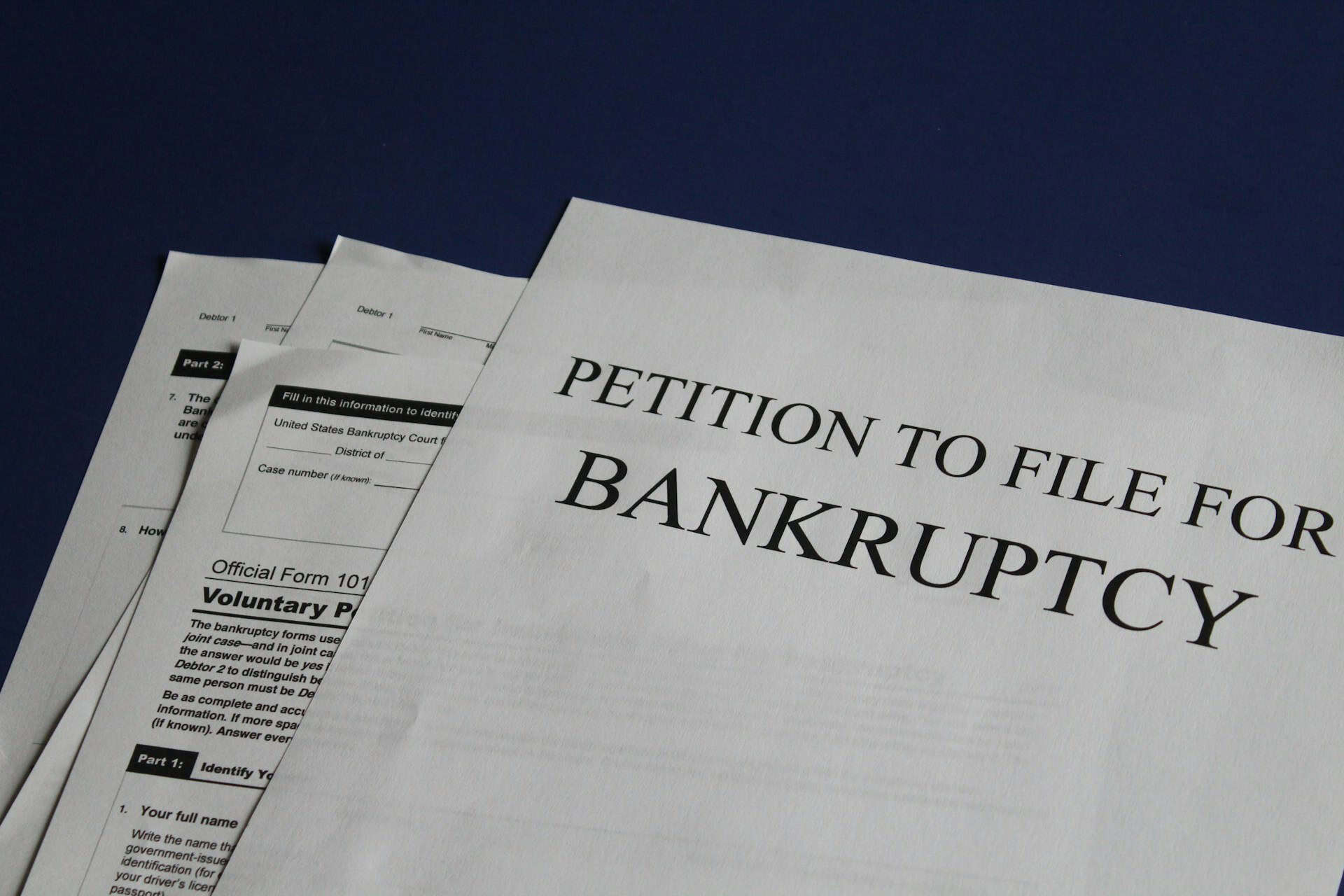 Bankruptcy papers sitting on a desk.