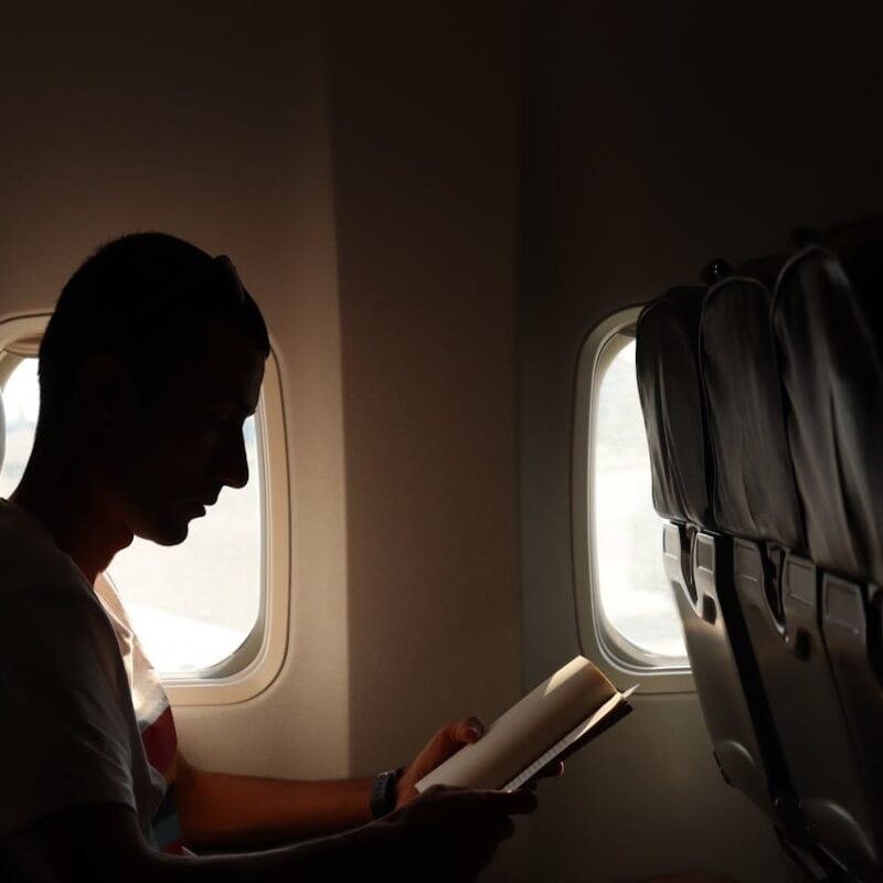 man flying to get a hair transplant abroad