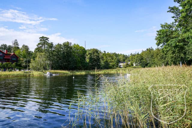 villa naturtomt modern arkitektur utsikt över sjö klippor location denmark scoutshonor 11