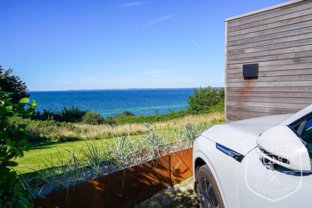 sommerhus moderne havudsigt træbeklædning sjælland location denmark scoutshonor 03