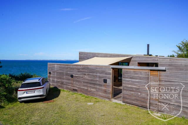 sommerhus moderne havudsigt træbeklædning sjælland location denmark scoutshonor 09