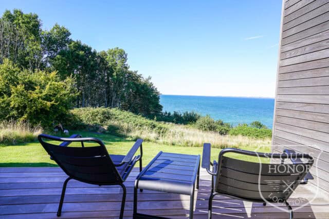 sommerhus moderne havudsigt træbeklædning sjælland location denmark scoutshonor 30