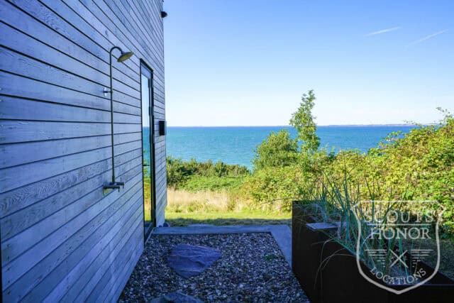 sommerhus moderne havudsigt træbeklædning sjælland location denmark scoutshonor 35