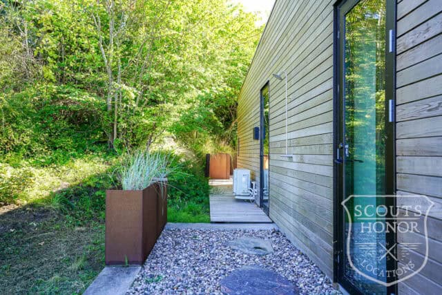 sommerhus moderne havudsigt træbeklædning sjælland location denmark scoutshonor 36