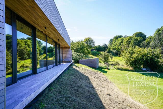 sommerhus moderne havudsigt træbeklædning sjælland location denmark scoutshonor 37