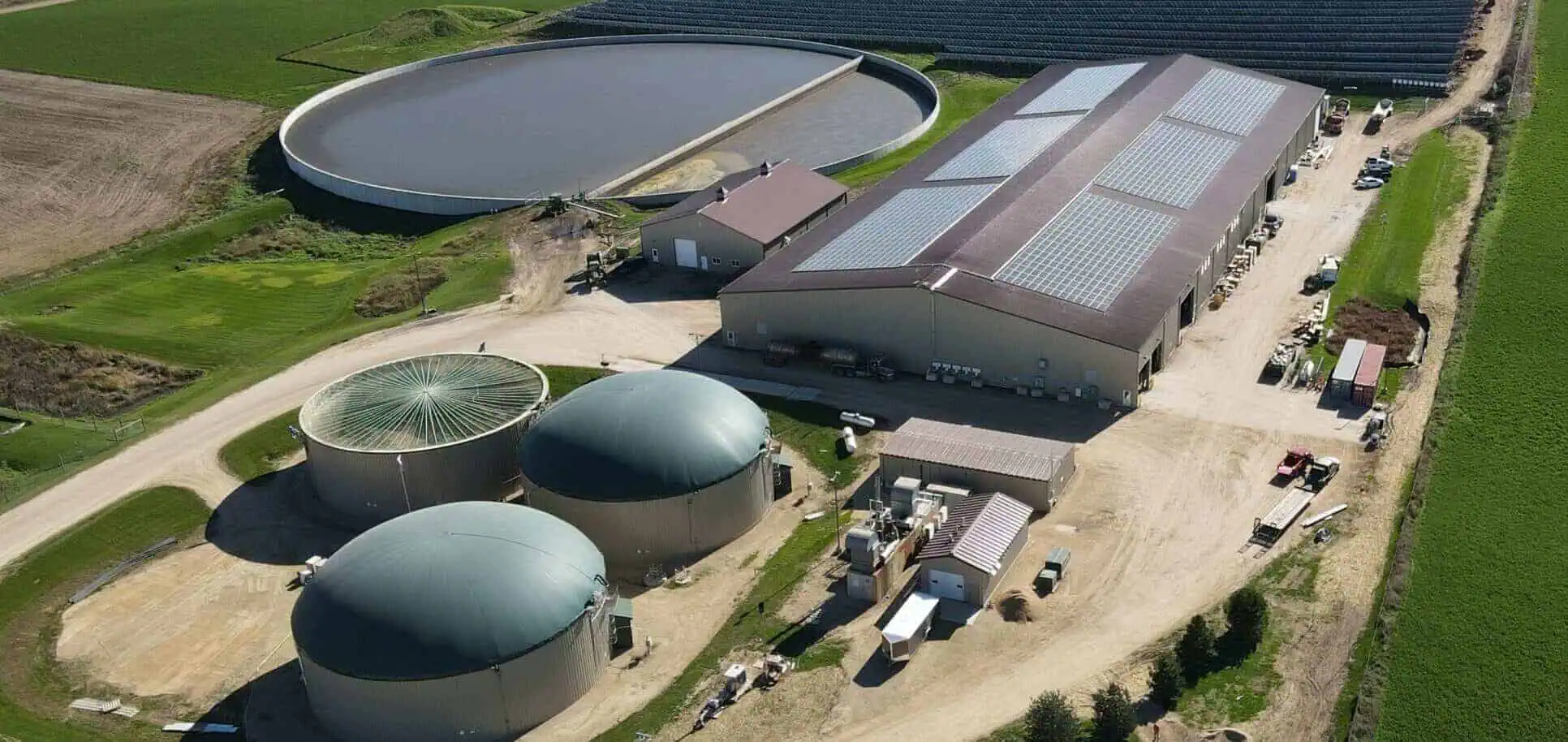 Aerial view of fuel storage tanks and processing plant for energy supply.