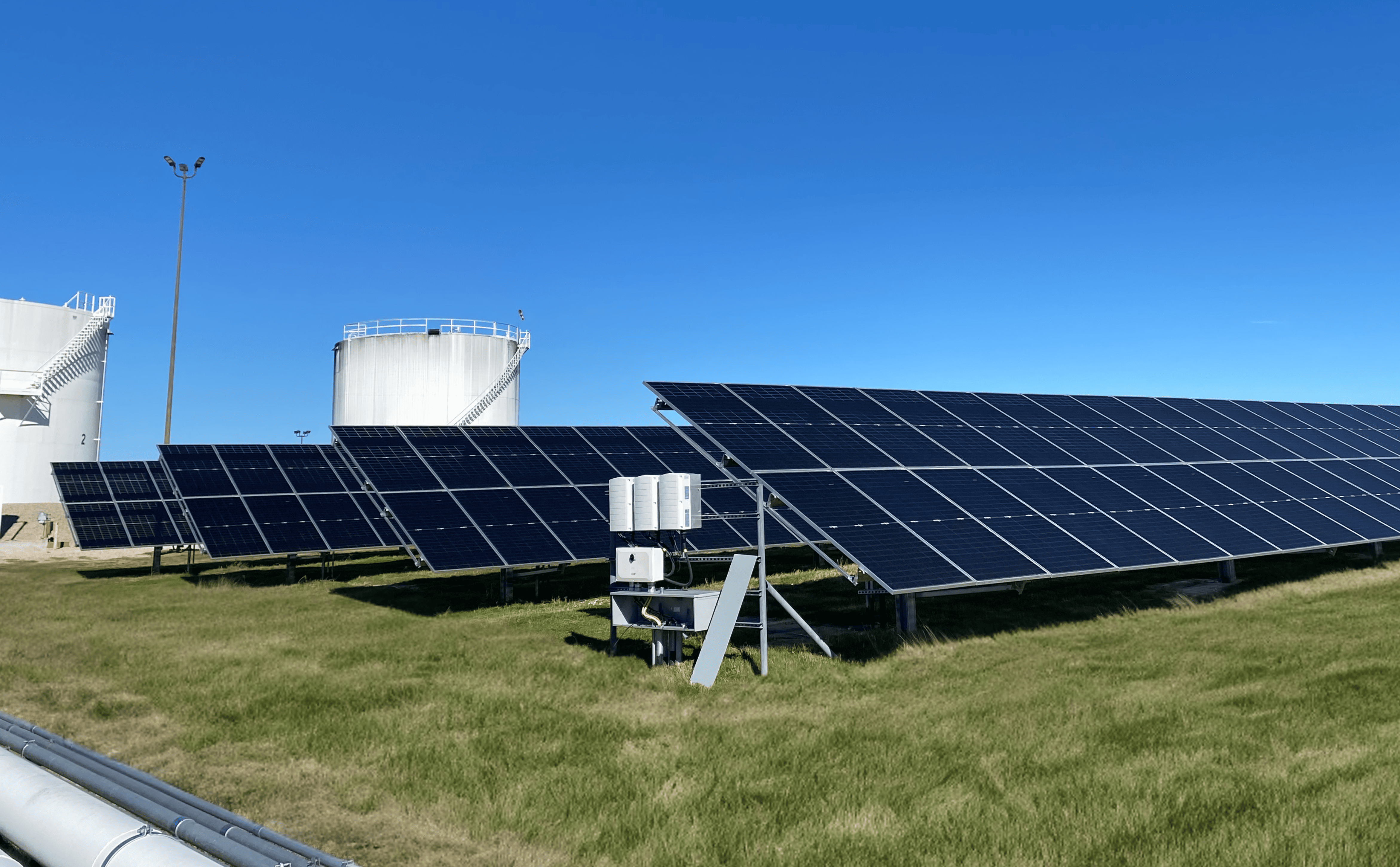 Solar panels at U.S. energy facility promoting renewable energy and clean power solutions.