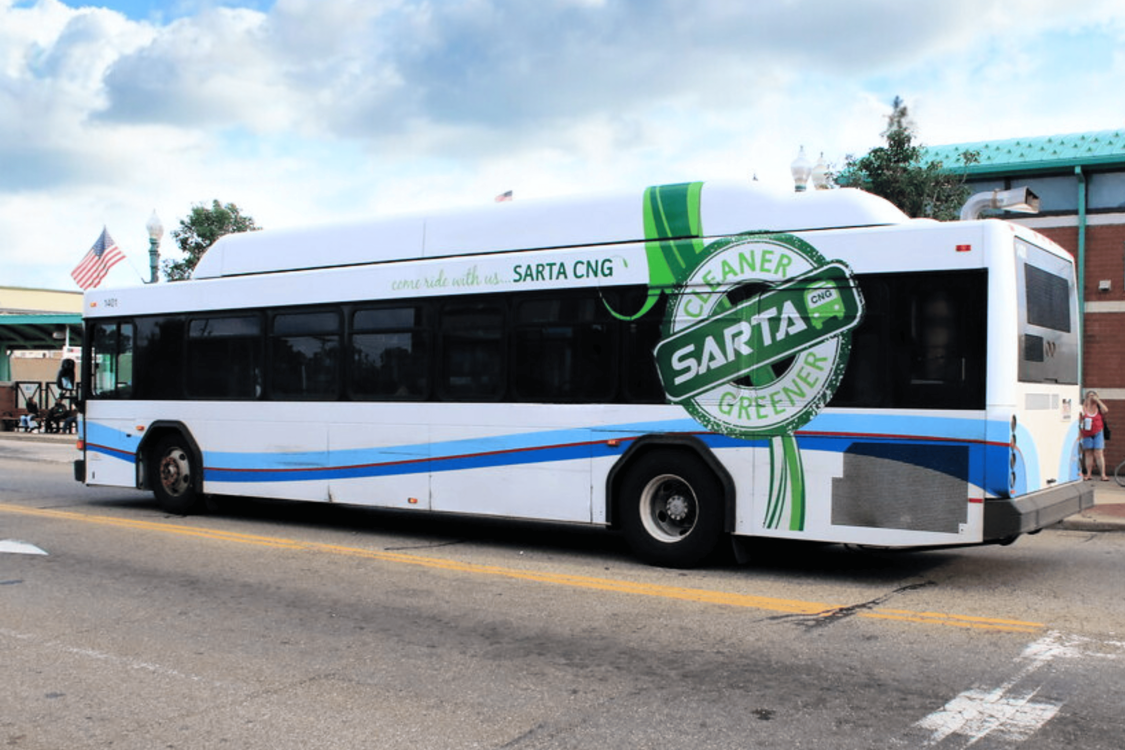 Electric bus powered by clean energy from SARTA CNG, promoting eco-friendly transportation.