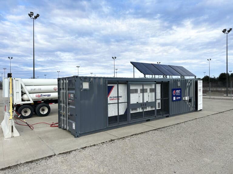 Mobile energy storage container with solar panels and EV charging capabilities at a U.S. Energy facility.