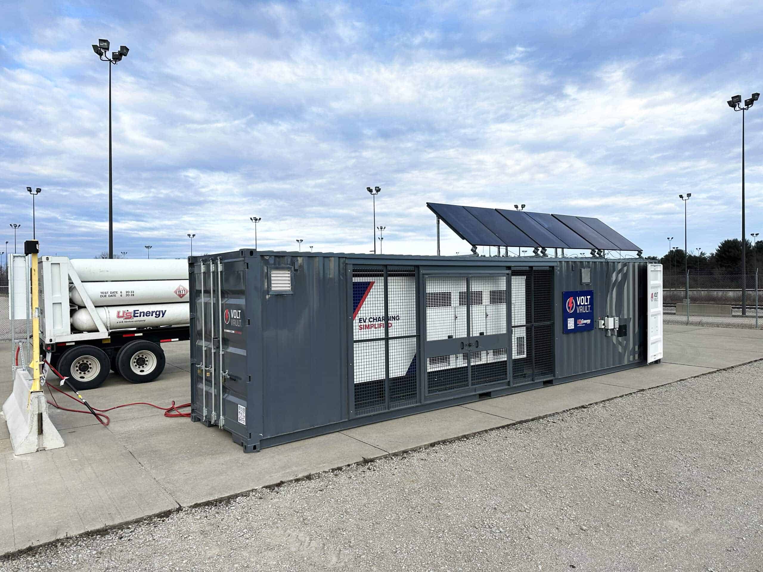 Mobile energy storage container with solar panels and EV charging capabilities at a U.S. Energy facility.