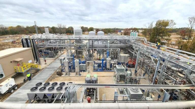 Renewable energy facility with solar panels and energy infrastructure for sustainable power generati.