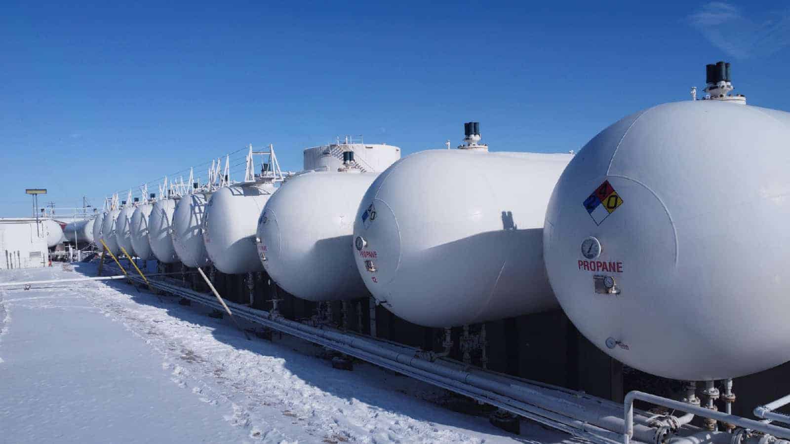 propane tanks lined up outdoors, snowy weather
